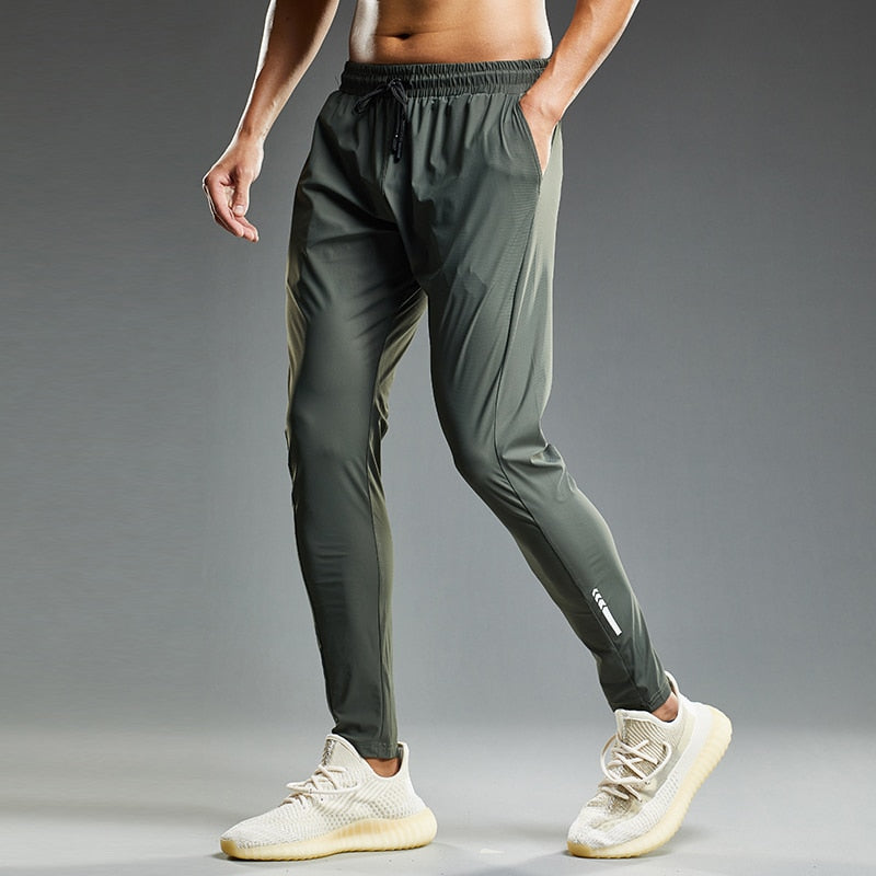 Calça Esportiva Elástica Bintuoshi
